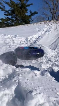 Sledding Kid Face Plants Into Snow Pile