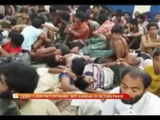 Lebih 1,000 PATI ditahan, bot kandas di beting pasir