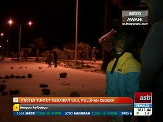 Protes tuntut kenaikan gaji, puluhan cedera