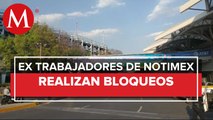 En CdMx, ex trabajadores de Notimex bloquean Terminal 1 del AICM