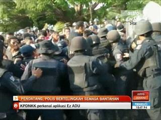 Pendatang, polis bertelingkah semasa bantahan