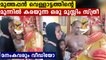 Muthappan wipes tears of Muslim woman who came near him, video goes viral | Oneindia