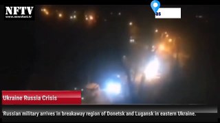 Russian military arrives in breakaway region of Donetsk and Lugansk in eastern Ukraine.