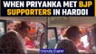 Priyanka Gandhi Vadra distribute Congress’s merchandise to BJP supporters, Watch |Oneindia News