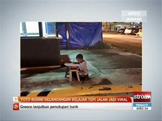 Foto budak gelandangan belajar tepi jalan jadi viral