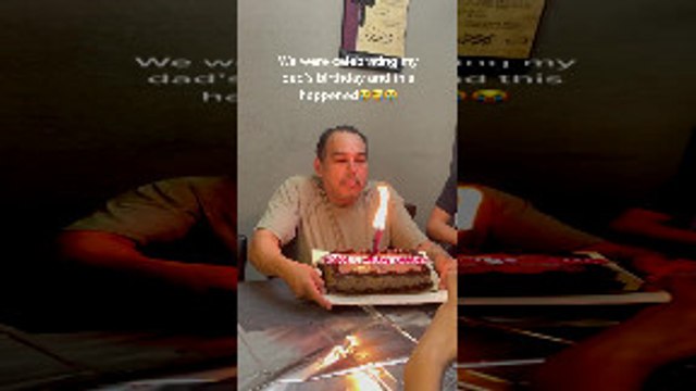 Dad Blowing Out Birthday Candles Loses Teeth