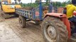 JCB loading mud in the Tractor trolley _ JCB Vi