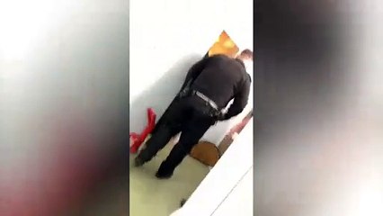 Police break down the door of a flat to find a body that has been dead for two years