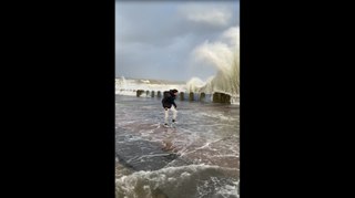 Guy Jumping Across Gap Gets Soaked by Tide