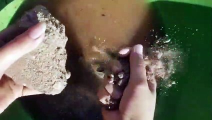 Gritty concrete sand blocks crumble in water satisfying asmr video