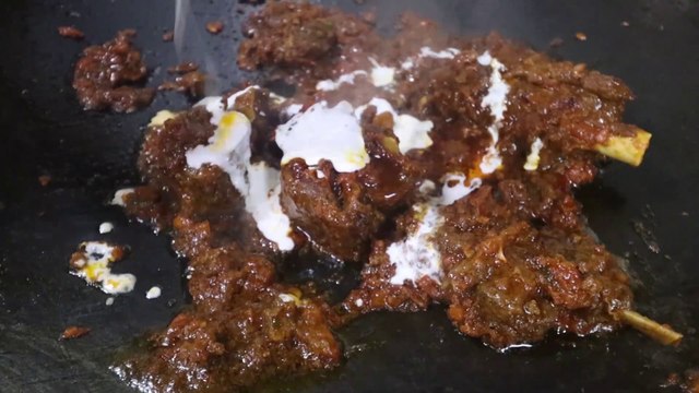 Delhi Street Food. Amazing Fish and Mutton on Street of Delhi Made Live on an Indian Pan. Indian Food