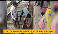 Bayi terselamat selepas jatuh di landasan kereta api