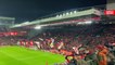 Leeds United's away fans compete with You'll Never Walk Alone at Anfield