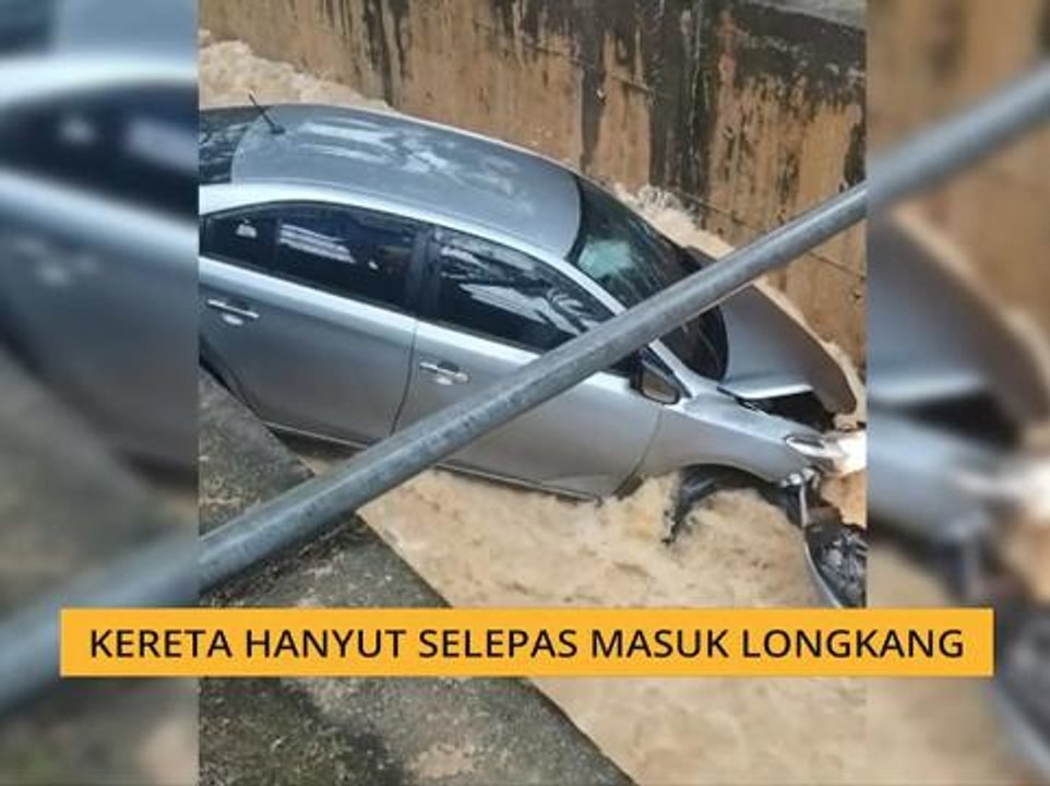 Kereta hanyut selepas masuk longkang