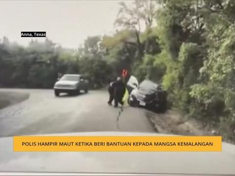Polis hampir maut ketika beri bantuan kepada mangsa kemalangan
