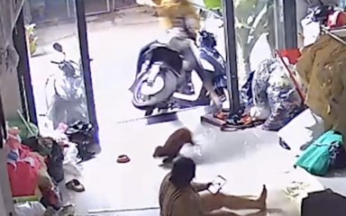 Out of Control Motorcycle Launches into Living Room