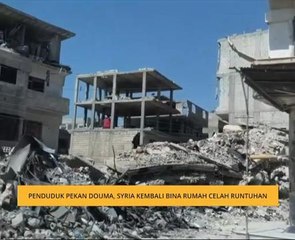 Penduduk pekan Douma, Syria kembali bina rumah celah runtuhan