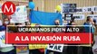 Con banderas y carteles, ucranianos protestan en la embajada de Rusia en CdMx