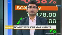 Tata Motors' Profit Nearly Halves