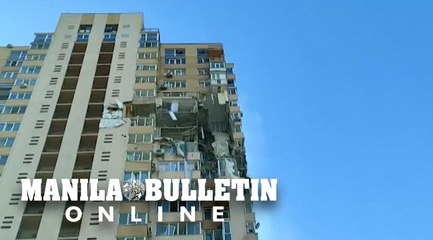 Kiev building hit by missile, victims evacuated