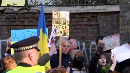 Protesters gather outside the Russian Embassy