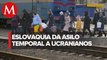 Ucranianos hacen fila para cruzar frontera con Rumanía y Eslovaquia tras invasión rusa