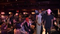 #MeToo fashion show opens with angel wing models, pig-faced men