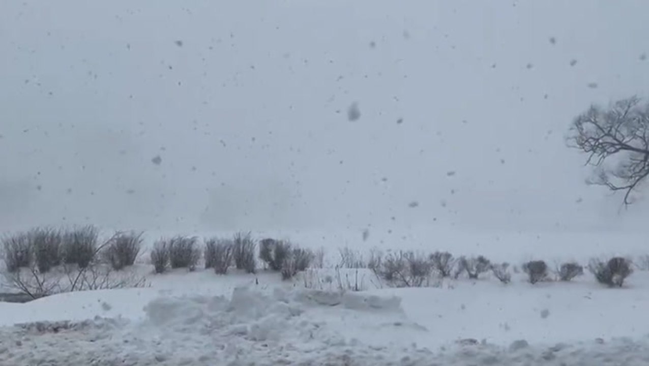 Passing snow squall sweeps through New York