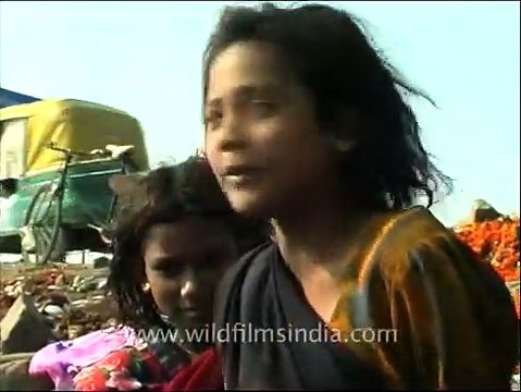 Indian rag picker girl sharing her life on-camera