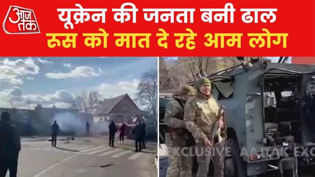 Ukrainian citizens stood unarmed in front of Russian tank