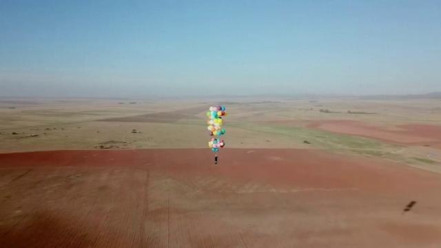 Man flies over South Africa in a chair tied to helium balloons