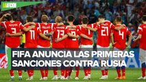 FIFA prohíbe la bandera y el himno de Rusia en todas sus competiciones