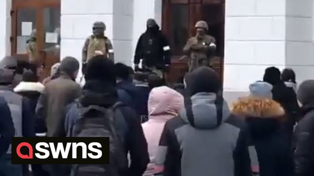 Ukrainians caught chanting Putin is a d***head at Russian soldiers