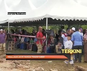 Ahli keluarga mangsa menunggu ketibaan jenazah mangsa tahfiz