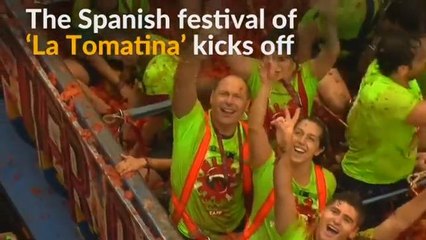 Revelers hurl tomatoes at each other in Spanish festival