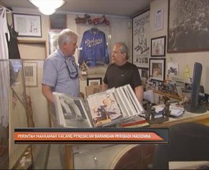 Perintah mahkamah halang penjualan barangan peribadi Madonna