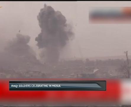 Iraqi soldiers celebrating in Mosul