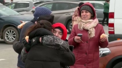 Image of the day: Girl embraces her friend after reaching Poland from Ukraine