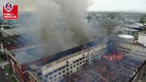 Drone captures smoldering remains of two large storage warehouses in Wickham | March 2, 2022 | Newcastle Herald