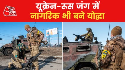 Ukrainian soldiers walking with their own country's flag