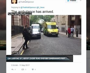Car carrying UK Labour leader runs over BBC cameraman's foot
