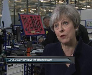 May urges voters to give her Brexit mandate