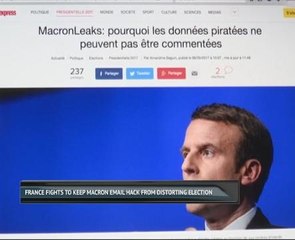 French fights to keep Macron email hack from distorting election