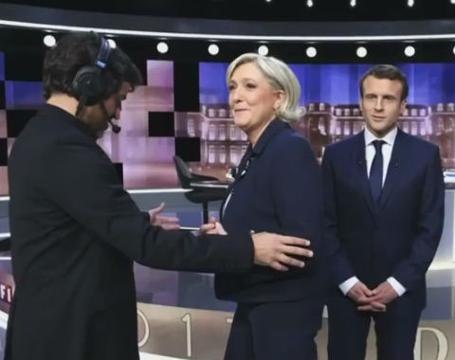 Macron supporters watch heated debate with Le Pen