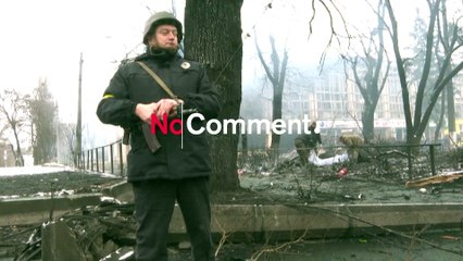 Ukraine soldiers remove bodies after Russian strikes on Kyiv TV tower