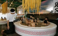 Inside this Japanese spa you can relax in a bath full of noodles!