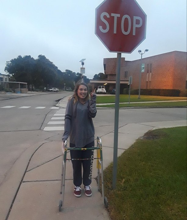 The moment a young woman takes her first steps after devastating car crash and four surgeries