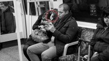 After taking photos of a bunch of strangers, he noticed something awful