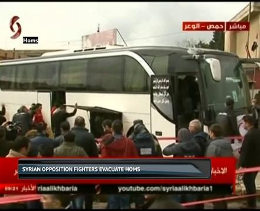 Syrian opposition fighters evacuate Homs