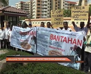 Kerjasama teksi-Uber: Pemandu dakwa tidak diajak berbincang